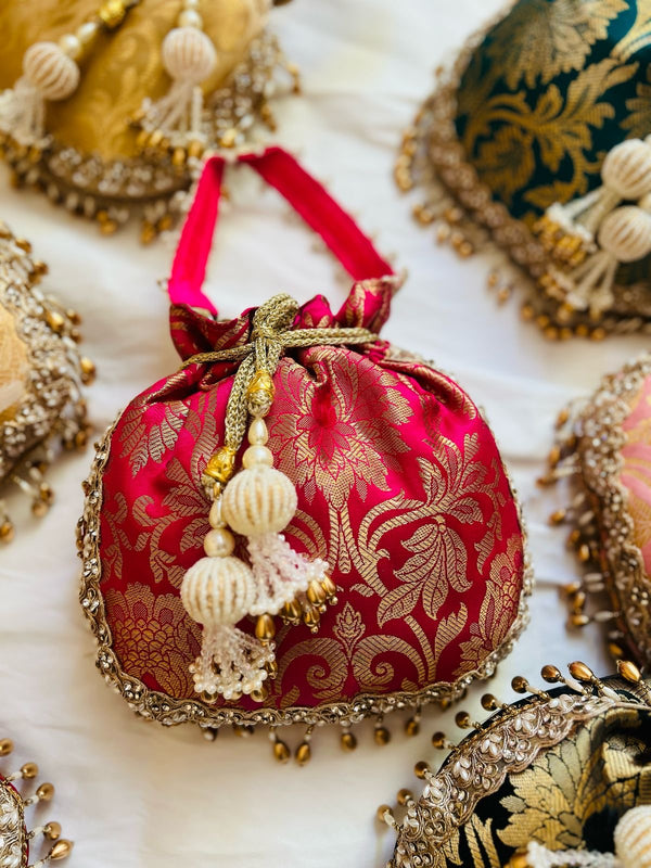 Rani Pink Brocade Potli Bag with Handcrafted Tassels