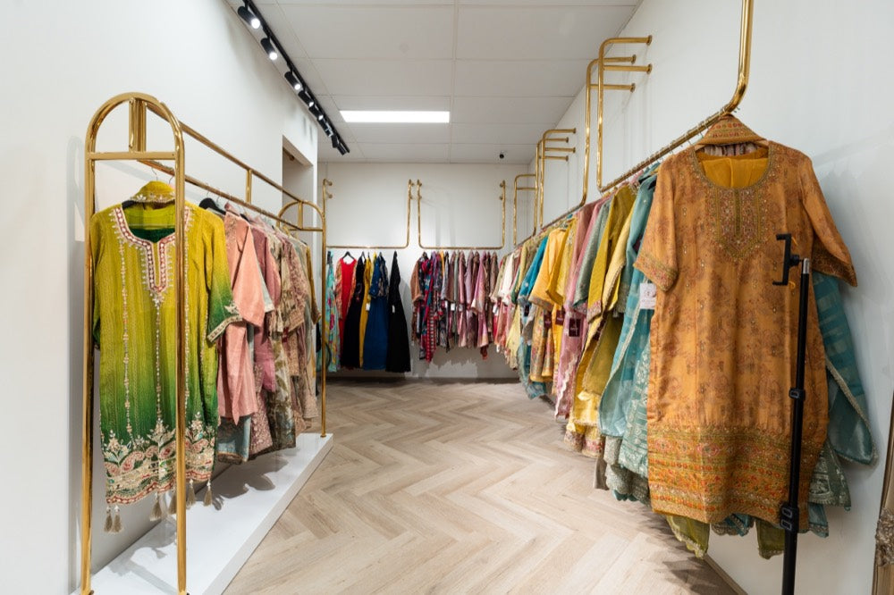 Racks of suits and kurtis at Queenz Closet